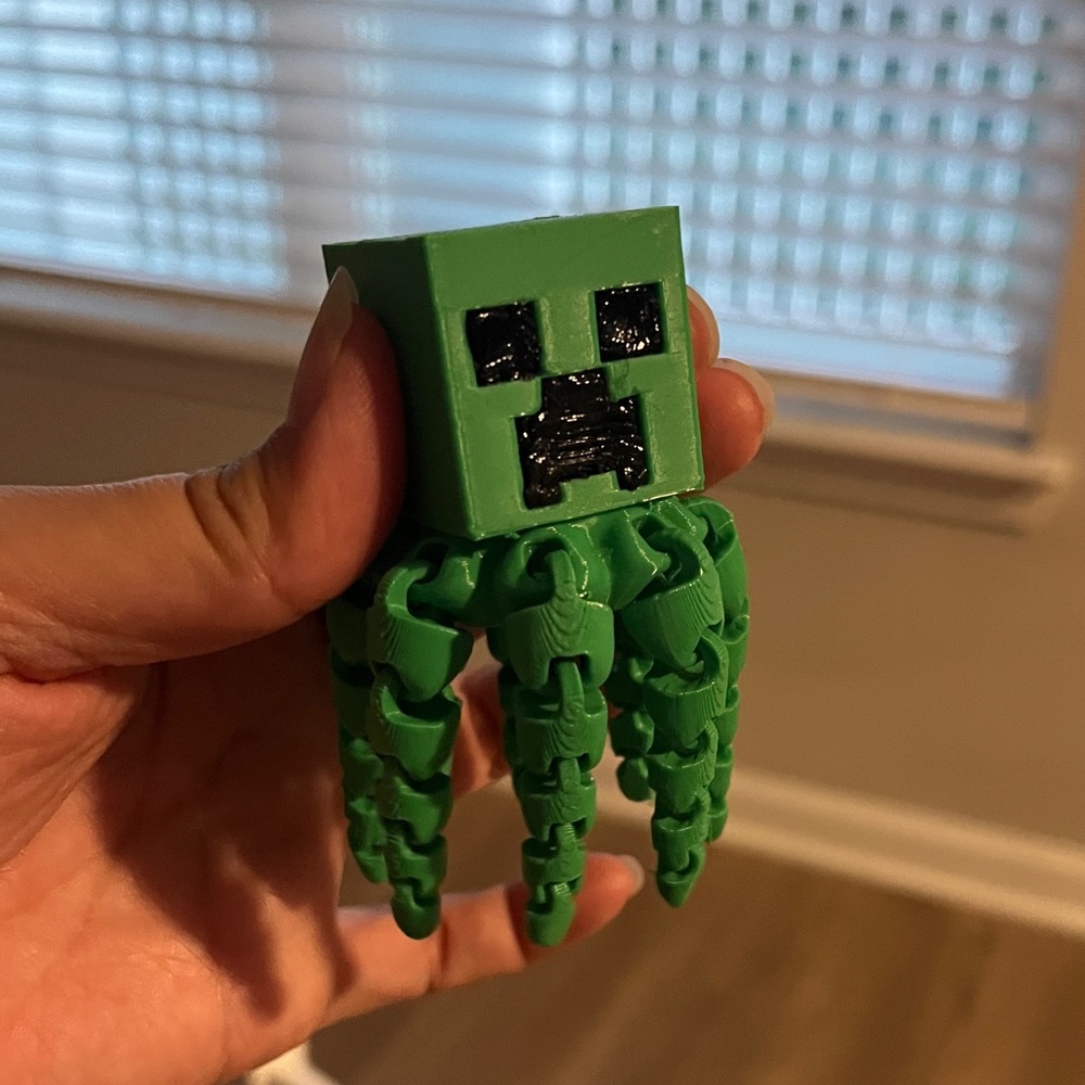 Green Creeper-Inspired Articulated Figure
